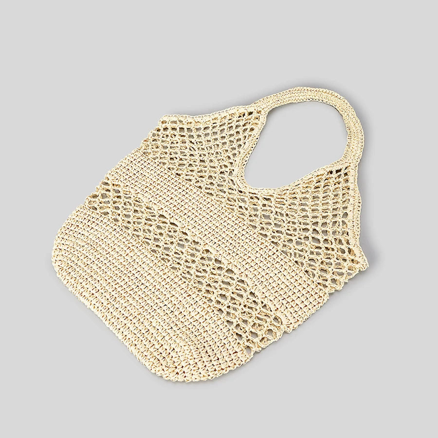 Sac de plage filet Malina avec serviettes et crème solaire