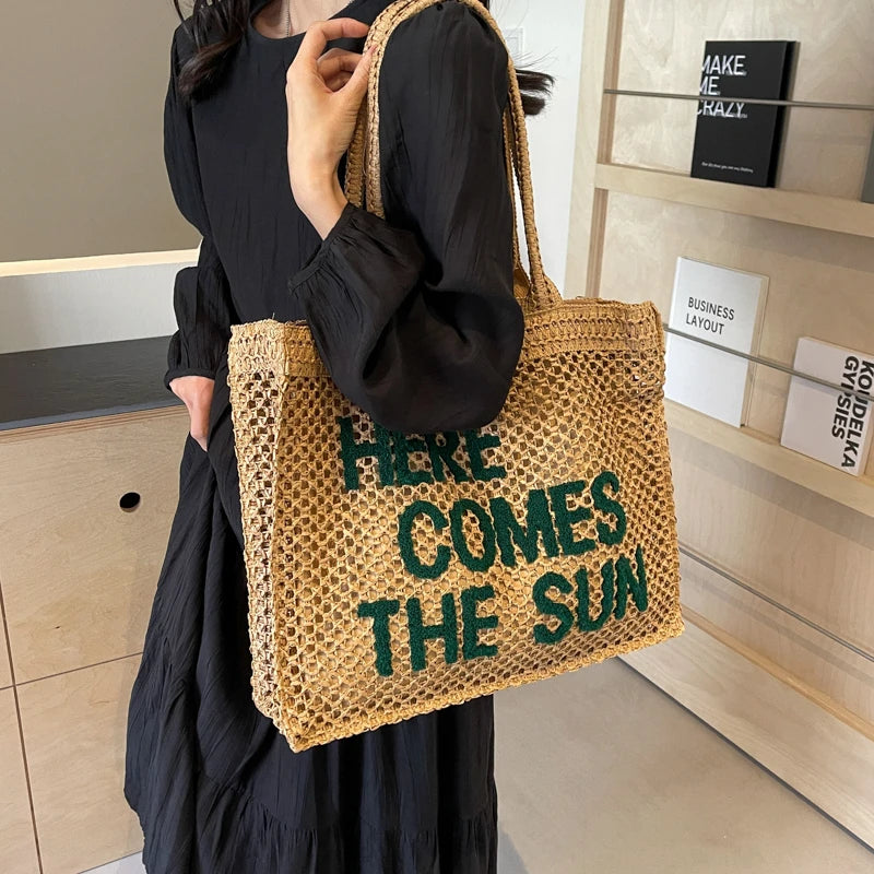 Détail des anses du sac de plage Siena
