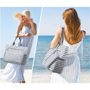 Sac de plage étanche Néroli posé sur le sable