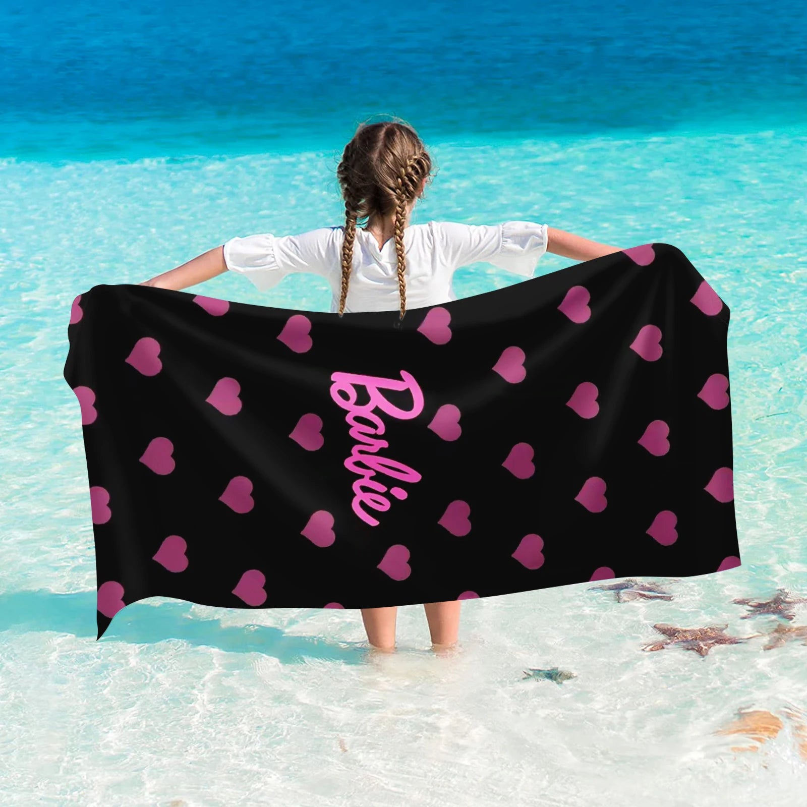 Serviette rose Barbie pour plage ensoleillée