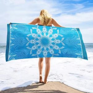 Élégante serviette de plage pour femme avec motif tropical